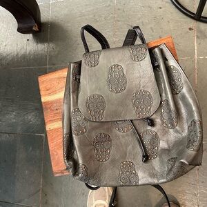 Olive Green Embossed Skull Drawstring Backpack